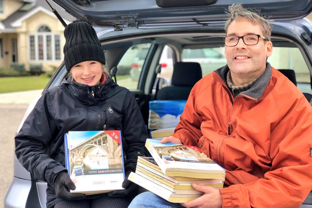 Volunteers Holding Books